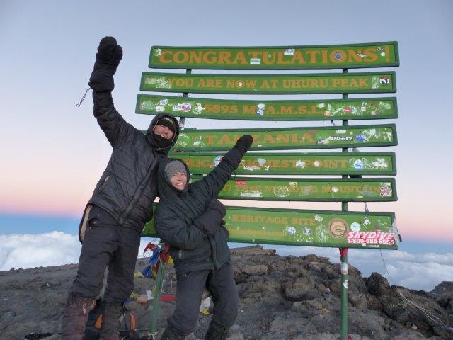 Mount Kilimanjaro Summit sign, success, mountain climbing in africa, tanzania safaris