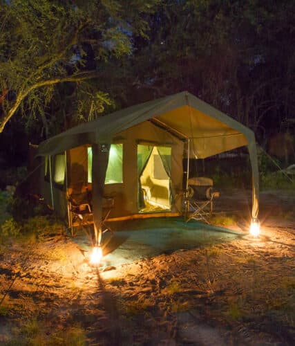 https://encompassafrica.com.au/wp-content/uploads/2024/02/Clients-tent-at-night-vertical.jpg