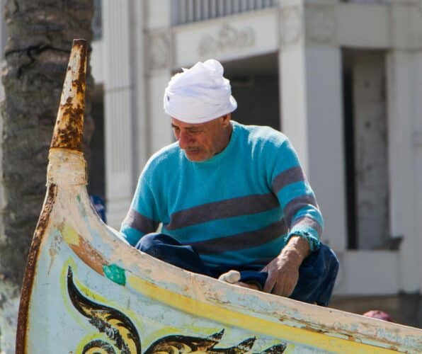 Alexandria fisherman Eating in Egypt article canvas image