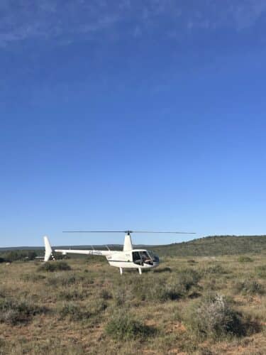 helicopter taking off during Briefing for the Kwandwe rhino conservation experience