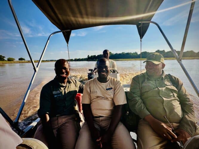 Boating safari Zambia river photo by Danica Wilson guides in the boat