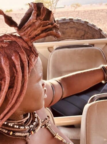 himba woman in vehicle Visiting a himba village from Hoanib Valley Camp Kaokoland with Natural Selection Travel Danica Wilson 2023
