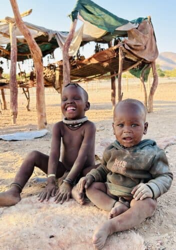 happy himba kids Visiting a himba village from Hoanib Valley Camp Kaokoland with Natural Selection Travel Danica Wilson 2023