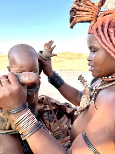himba woman and child Visiting a himba village from Hoanib Valley Camp Kaokoland with Natural Selection Travel Danica Wilson 2023