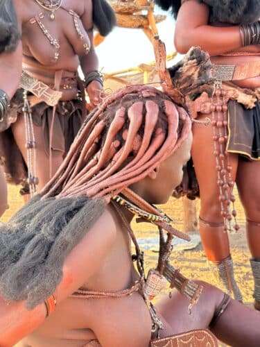 Visiting a himba village from Hoanib Valley Camp Kaokoland with Natural Selection Travel Danica Wilson 2023 hairstyle from the side profile