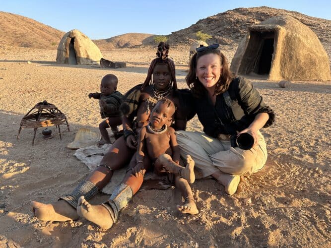 Danica and himba children Visiting a himba village from Hoanib Valley Camp Kaokoland with Natural Selection Travel Danica Wilson 2023