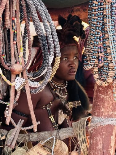Himba woman selling her jewellery hand made Visiting a himba village from Hoanib Valley Camp Kaokoland with Natural Selection Travel Danica Wilson 2023