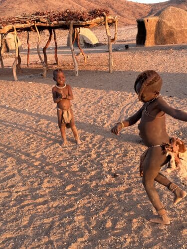 himba children in the village Visiting a himba village from Hoanib Valley Camp Kaokoland with Natural Selection Travel Danica Wilson 2023