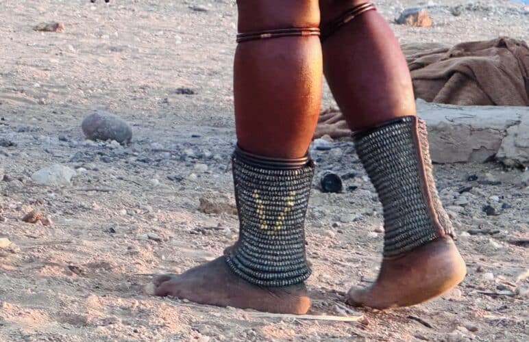 anklets of himba woman Visiting a himba village from Hoanib Valley Camp Kaokoland with Natural Selection Travel Danica Wilson 2023