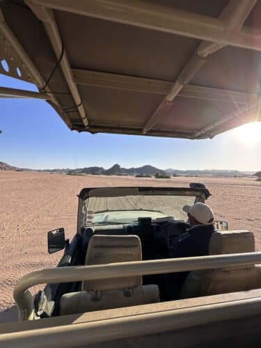 Kaokoland DW trip 2023 4x4 vehicle open plain guide driving